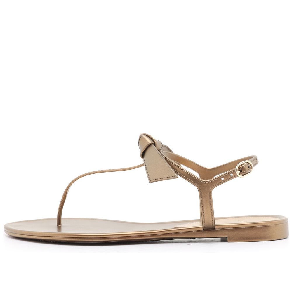 sandalia-rasteira-clarita-jelly-dourada-alexandre-birman-1 sandalia-rasteira-clarita-jelly-dourada-alexandre-birman-1