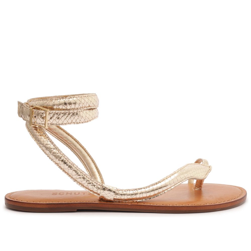 sandalia-rasteira-courtney-couro-dourada-schutz-1 sandalia-rasteira-courtney-couro-dourada-schutz-1