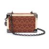 clutch-isla-trunk-sirena-monograma-canvas-caramelo-2