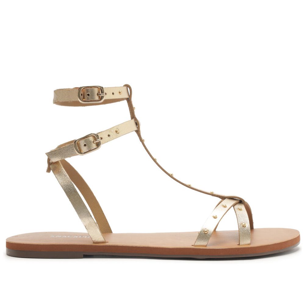 sandalia-anacapri-rasteira-gladiadora-tachas-dourada-1